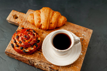 coffee, cup, breakfast, drink, croissant, food, beverage, pastry, black, white, cake, cafe, snack, dessert, sweet, morning, hot, baked, espresso, bread, brown, caffeine, tea, meal, table