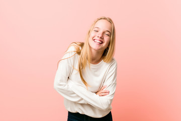 Young blonde teenager woman laughing and having fun.