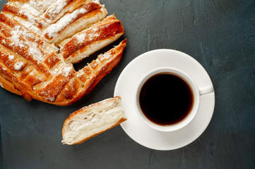 coffee and banana pie on a stone background, morning breakfast