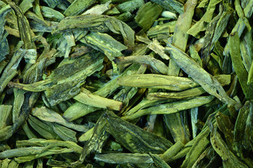 Loose leaf green tea in close up. Longjing tea, Dragon Well tea, origin of China. Expensive, very...