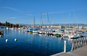 Fototapeta na wymiar Boats in the bay of Lake Geneva. Geneva, Switzerland.
