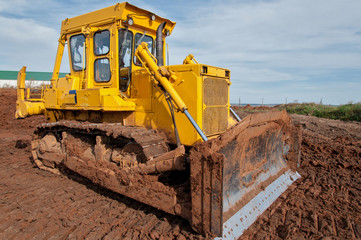 Large construction bulldozer at a construction site.