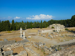 Complete view from above of the columns of the healing temple Asclepeion with sea view