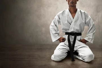 Fototapeten Karate martial arts fighter sitting © fotokitas