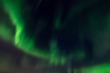 The polar arctic Northern lights aurora borealis sky star in Norway Svalbard in Longyearbyen city the moon mountains