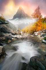 Matterhorn over a mountain stream in autumn
