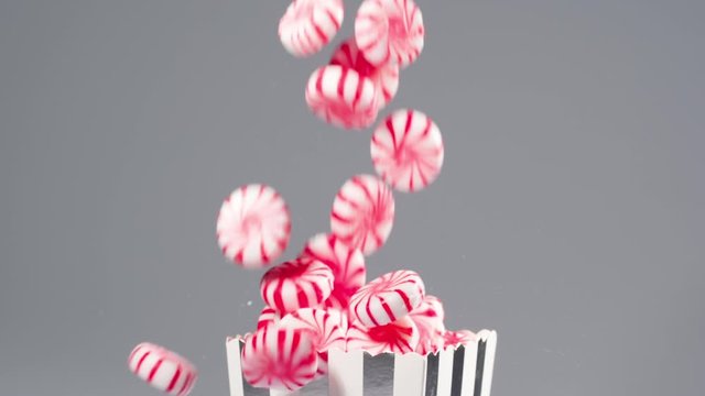 Peppermint candies falls in slow motion