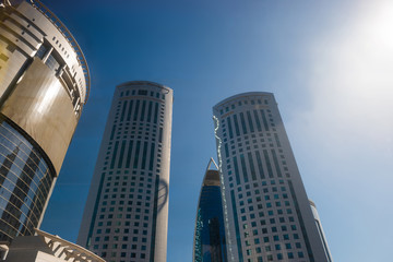 Obraz premium Skyscrapers and modern office buildings at downtown of Doha city on clear sky background. Doha, Qatar