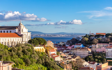 Lisbon city from the air , rooftop view of historical touristic places of the capital in a sunny day in Portugal