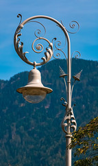 Fototapeta na wymiar Beautiful view with a historical street lamp at Meran, South Tyrol, Italy