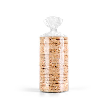 Puffed whole grain Crispbread stack in transparent plastic bag isolated on white background. Packaging template mockup collection. Stand-up Front view package.