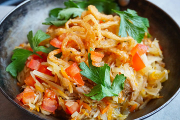 braised cabbage with tomato, onion fries and herbs