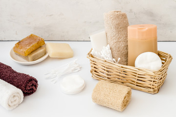 Bathroom cosmetics and hygiene products on white background