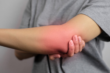Women with pain in elbow.