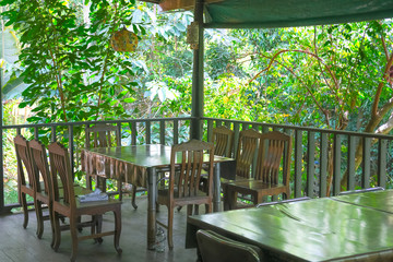 wooden table and chair in restaurant