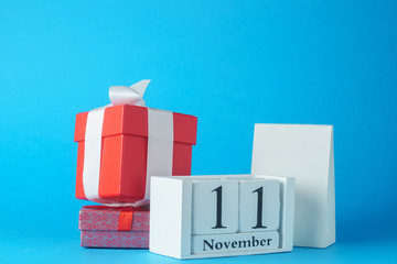 November 11, shopping day, gifts on a blue background