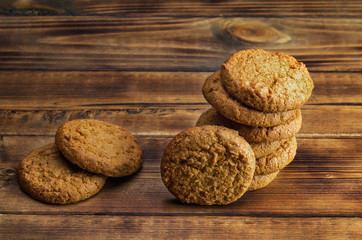 Group of oatmeal cookies on wooden surface