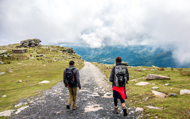 two hikers in the mountains