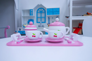 A set of children's dishes on the table