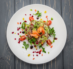 Fresh salad with vegetables, sprouted grains and shrimp