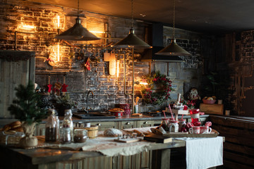 Fototapeta na wymiar Cozy and warm kitchen with Christmas decor. Happy New Year