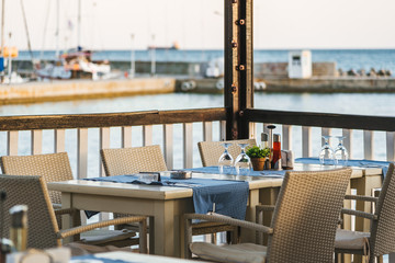 Restaurant interior/exterior. Restaurant near the sea/ocean. 