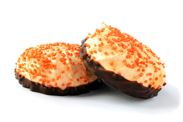 Sea-buckthorn marshmallows with chocolate on a white background. Orange marshmallow in chocolate isolated on a white background. Chocolate marshmallow with sea buckthorn, Russian marshmallow.