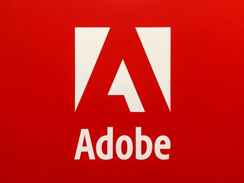 White Adobe Logo On Red Background