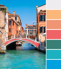 Color matching palette from travel background with aged orange houses, pink bridge and turquoise water in canals in central Venice in Italy under blue sky