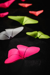 Multi-colored origami butterflies from above