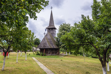 Fototapeta na wymiar Oldest wooden church in Romania, located in Oas County heritage park in Negresti-Oas, Romania