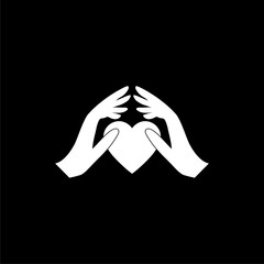 Hands holding heart icon isolated on black background