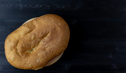 Pita bread on a wooden background