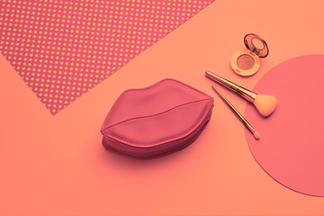 Fashion Lady Flat lay. Woman Essentials Set. Beauty accessories, Trendy Clutch, Brushes, lipstick. Coloful fashionable pink Minimal. art Creative gel filter pop art concept
