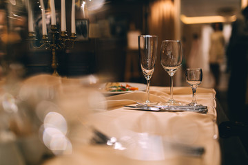 waiter pouring wine in a restaurant