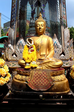Golden Buddha statue enshrined the outdoor