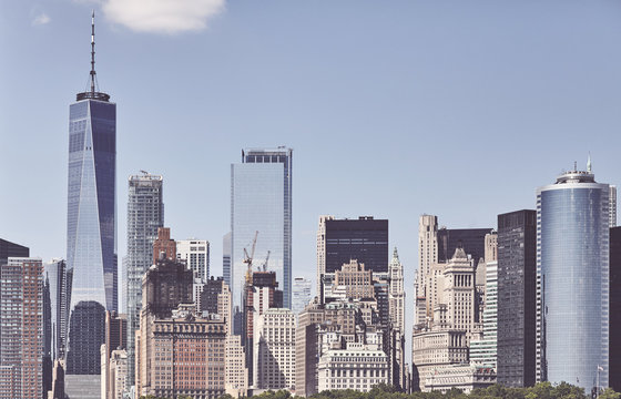 Retro toned picture of Manhattan cityscape, New York City, USA.