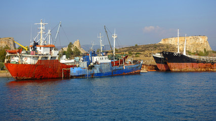 Old abandoned shipyard with scrap boats left to rust in Elefsina area, Attica, Greece