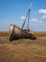A boat in Thornham Old Harbour, Norfolk, England