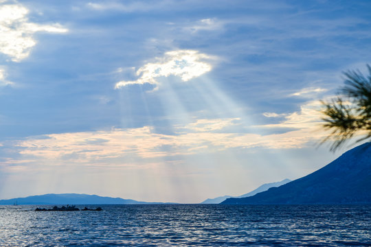 Crepuscular Rays Over The Sea.