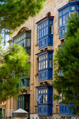 Fototapeta na wymiar Traditional Malta colorful balconies 