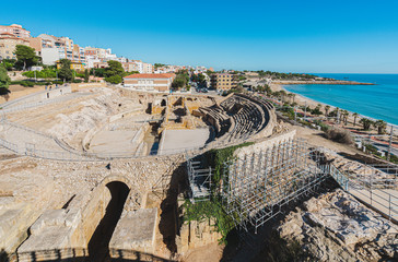 Ancient roman amphitheater of Tarragona, Spain, next to the Mediterranean sea in Costa Dorada,...