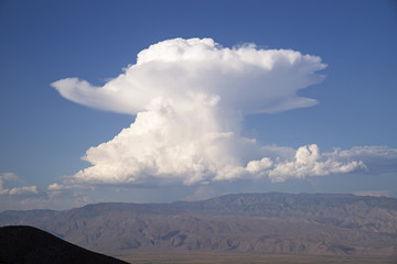Cumulonimbus Cloud Over The Inyo Mountains - obrazy, fototapety, plakaty