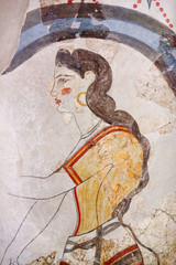 Wall painting of the ancient House of the Ladies depicting a female figure from Minoan Settlement...