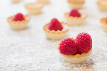 sweets and cakes with raspberries