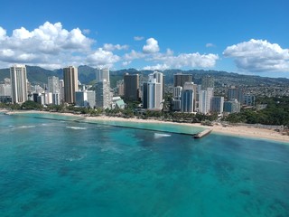 Panorama aerial view of Waikiki beach Hawaii USA white sandy beach turquoise blue waters luxury hotels and resorts 