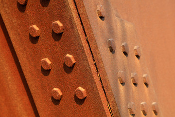 oxidized rusty steel plate and rivet