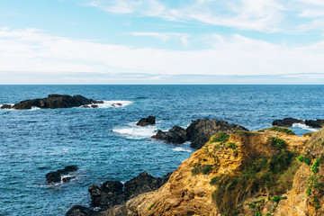 rocky cliff on the coast in atlantic ocean