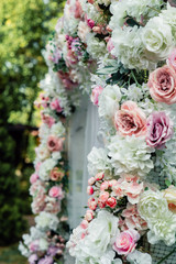 wedding arch decorated with beautiful flowers