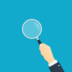 Magnifying glass in hand. Search loupe. Vector illustration in flat style